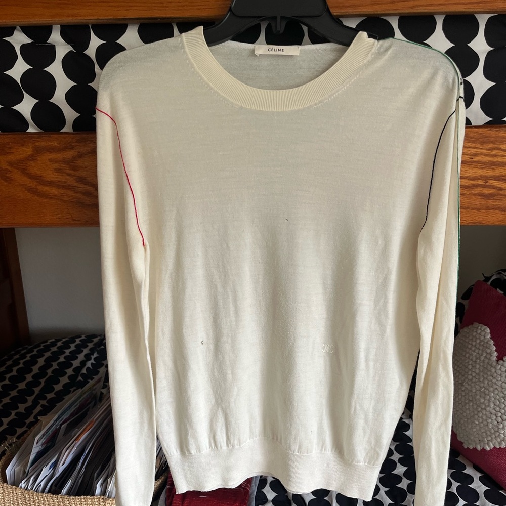 NWOT. Celine Couture Sweater.Dallas Flagship Store.Never wornthree small holes.